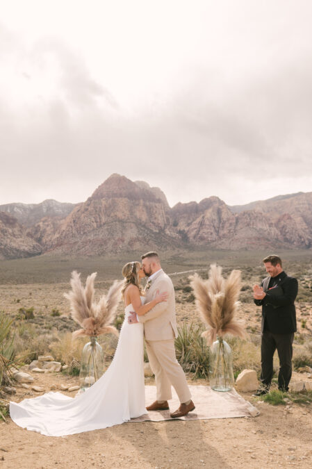 First kiss with beautiful red rock canyon backdrop