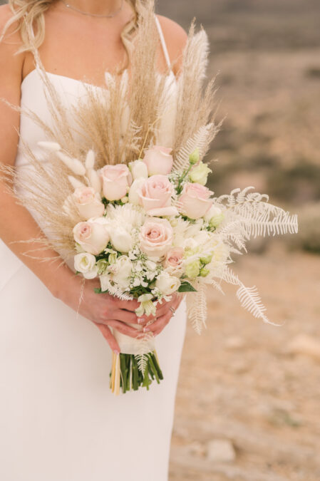 pink roses bouquet with pampas for desert elopement