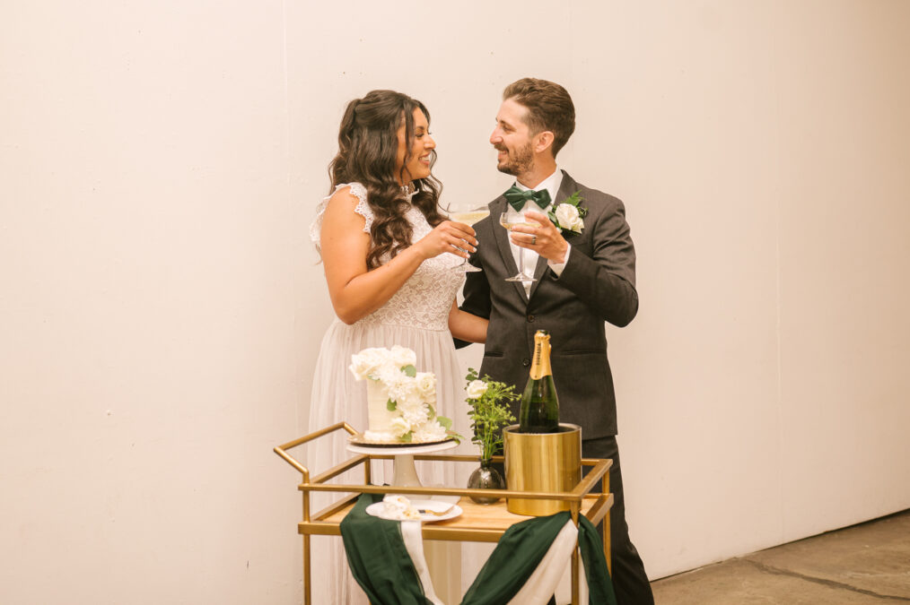 bride and groom champagne cheers