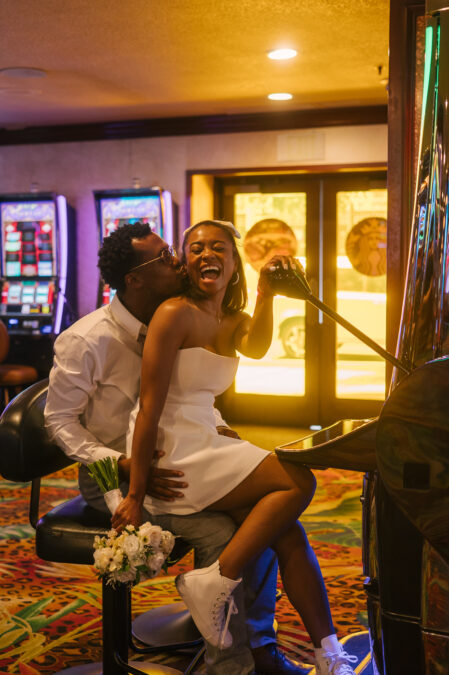 bride and groom at the slot machine inside El Cortez casino