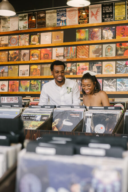bride and groom in record store downtown las vegas