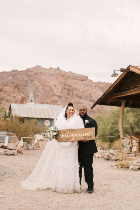 lasvegas winter bride and groom with just married sign