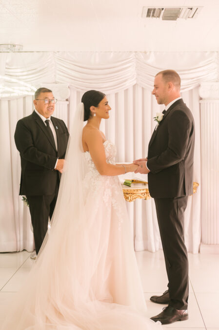 bride and groom at the alter in the Las Vegas little white wedding chapel