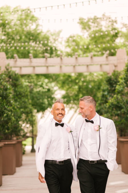 las vegas same sex couple in white jackets on their wedding day
