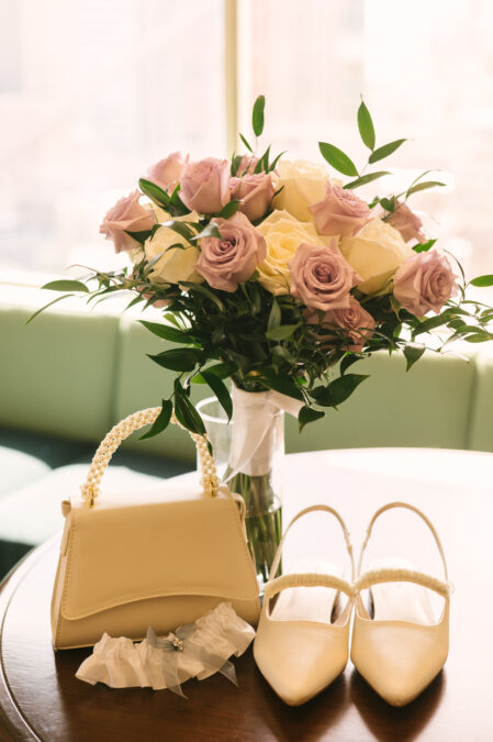 park mgm wedding day bride details with flowers and shoes