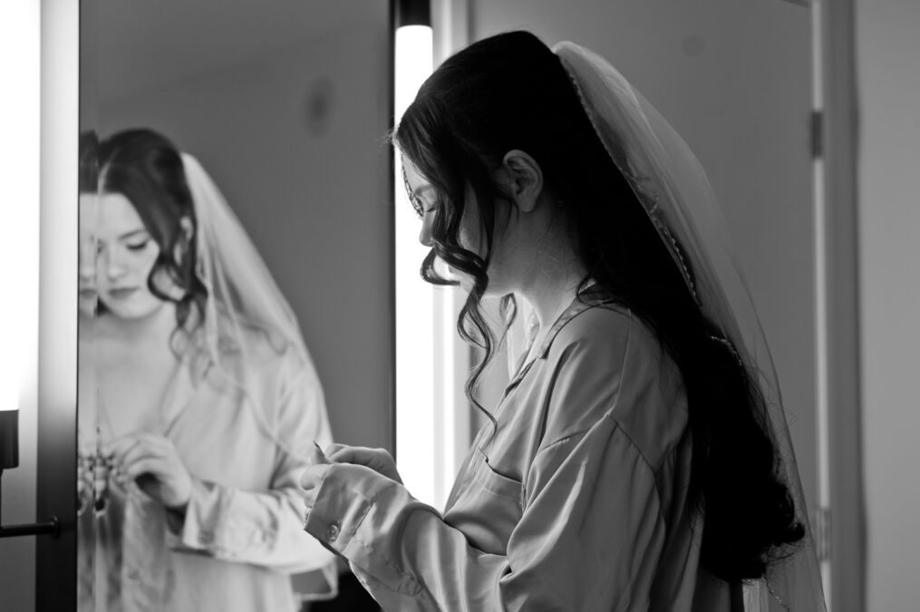 bride getting ready for her wedding at park mgm las vegas hotel room