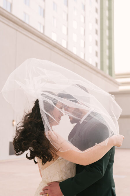 las vegas bride and groom veil portraits at park mgm rooftop