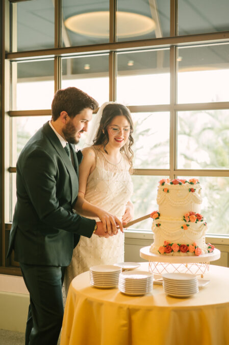 bride and groom cutting their retro inspired cake for park mgm hotel micro wedding