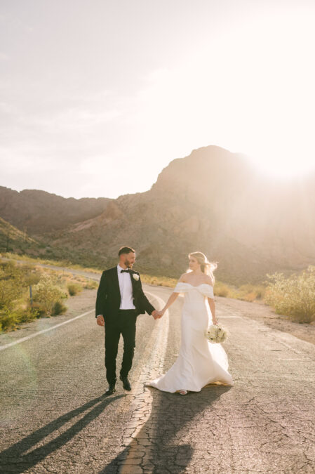 las vegas UK destination bride and groom walking on road photo 