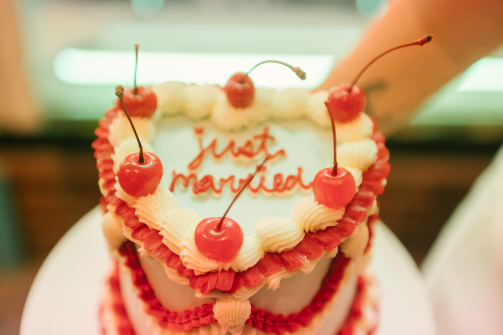 popular vintage heart shaped blue and red cake with cherries