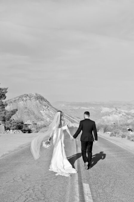 las vegas UK destination bride and groom walking on road photo 