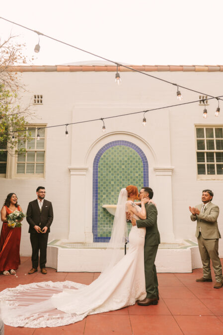 Las Vegas wedding ceremony kiss at the historic 5th street school in downtown 