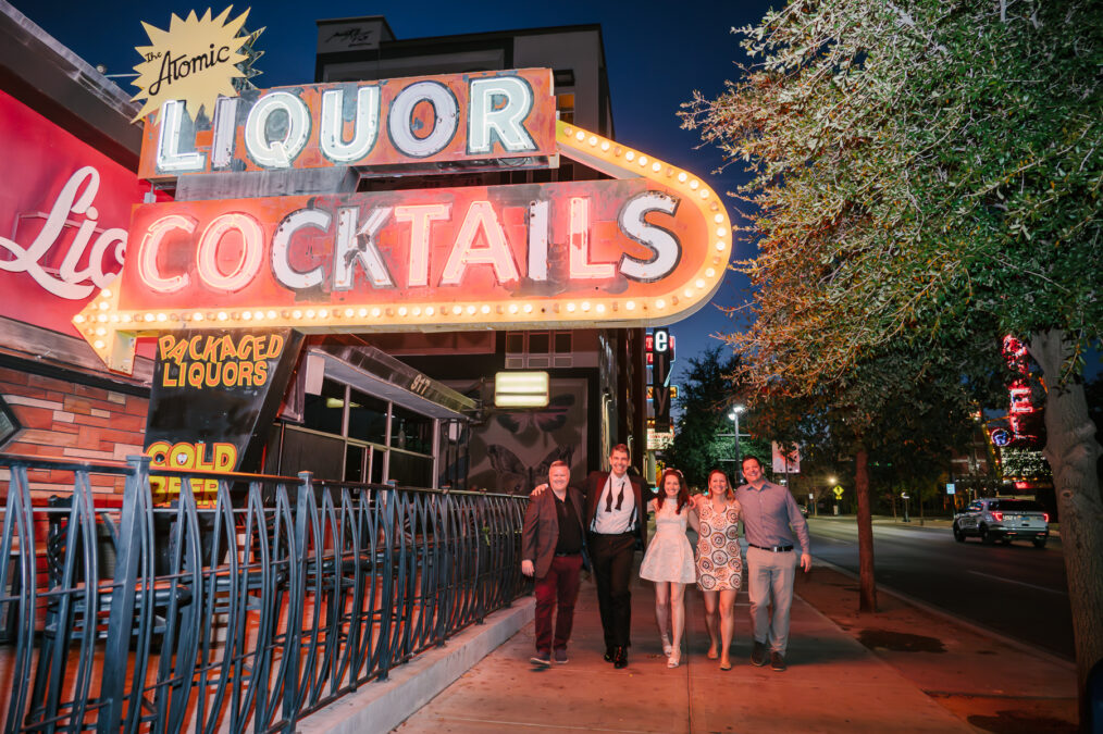 las vegas downtown wedding walking in front of atomic liquor on fremont street