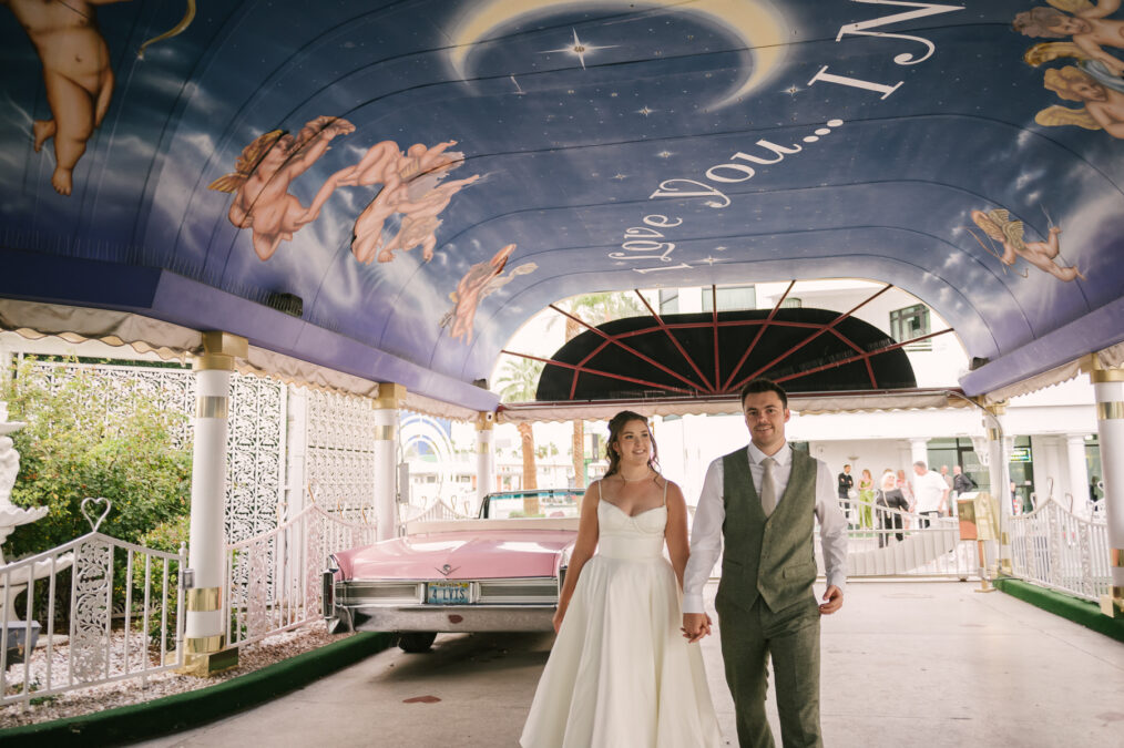 fall las vegas elopement at the little white chapel with pink cadillac