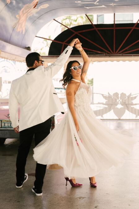las vegas Little White Wedding Chapel elopement twirling bride and groom
